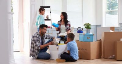 Whole family looks a happy to having a new home