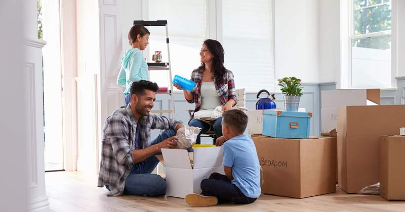 Whole family looks a happy to having a new home