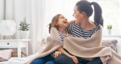 mother and daughter lovely playing and laughing each other