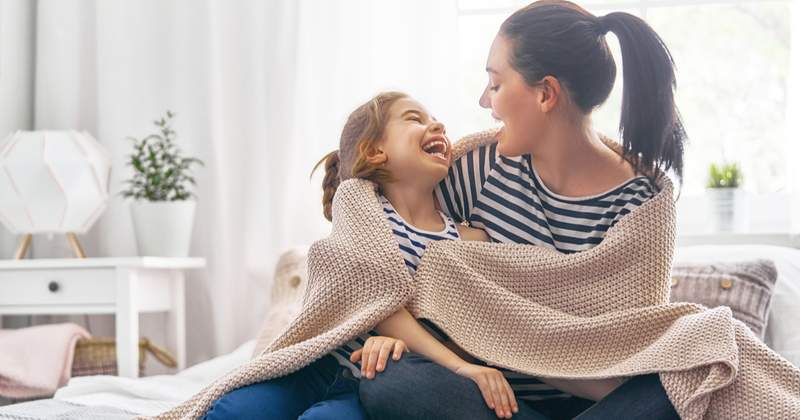mother and daughter lovely playing and laughing each other