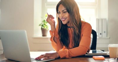 Woman on mini office working from home