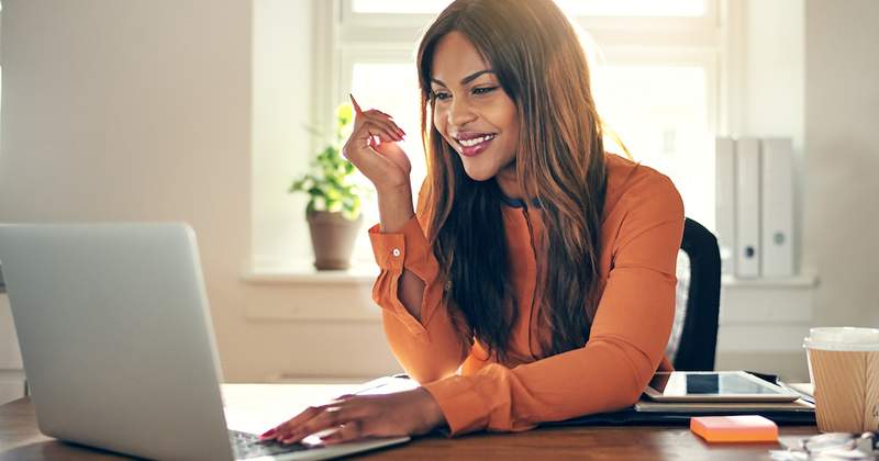Woman on mini office working from home