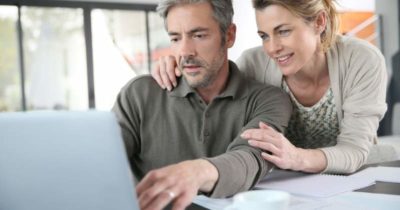 Husband and wife looking for home online